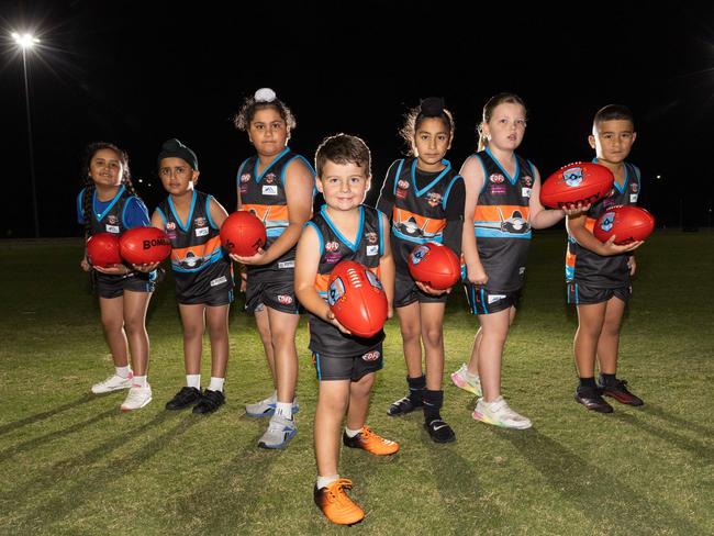 MELBOURNE, AUSTRALIA - MAY 1 2025Japjot Kaur, Parwan Singh, Mehtab Singh, Jack Bacon, Gurabhay Singh Nagra, Emily Bacon and Solomon Semisi from the Hume Bombers football club. The club is only eight years old and was founded as a junior footy club exclusively for Indian families. It has been a raging success and they have launched their first senior team this season as well.Picture: Brendan Beckett