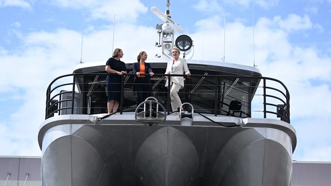 Federal Environment Minister Tanya Plibersek (right), Queensland Environment Minister Meaghan Scanlon (centre) and QLD Senator Nita Green inspect a new Great Barrier Reef patrol boat Tamoya in Brisbane. Picture: NCA NewsWire / Dan Peled