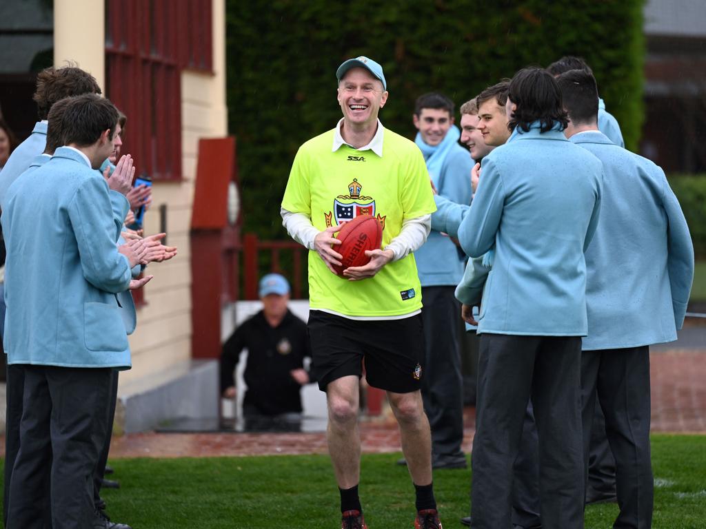 Troy Selwood with Sherrin in hand. Picture: Geelong Grammar