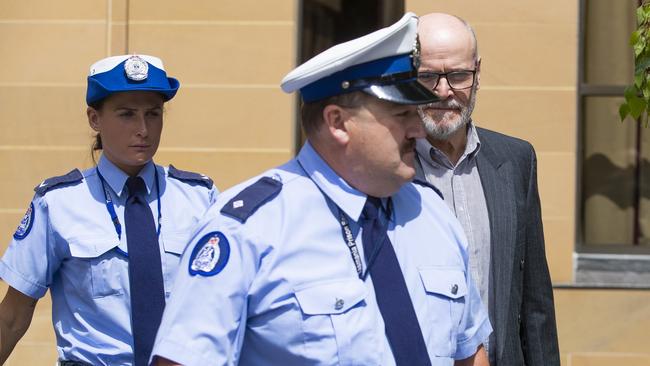 Convicted sex offender Darrel George Harington leaves the Supreme Court in Hobart.