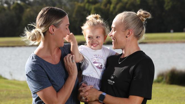 Matildas star Tameka Yallop (right) on the Gold Coast with her family, wife Kirsty Yallop (left) and their daughter Harley. Picture: Glenn Hampson