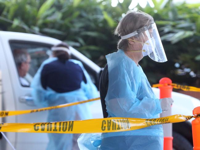 Sample collectors on the front line, testing thousands of people concerned about coronavirus around Queensland. Picture: NCA NewsWire/Richard Gosling