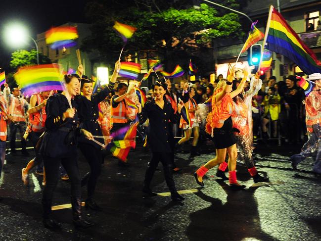 Marchers in the Sydney Gay and Lesbian Mardi Gras parade. Beyond the costumes and fun the event has a serious and heartfelt political message.