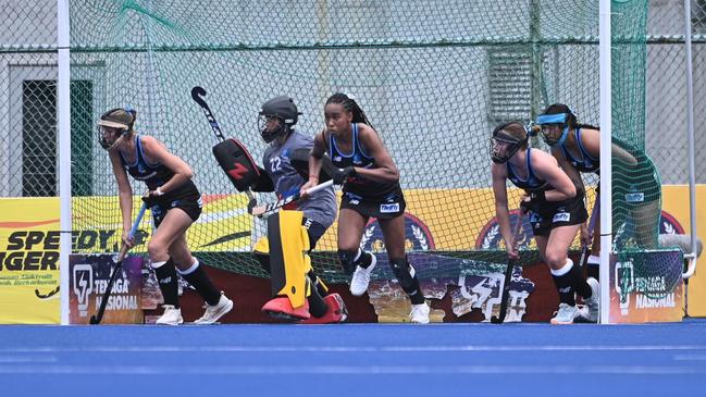 Territory Stingers women lining up in defence in the goal mouth. Picture: Hockey NT / Territory Stingers