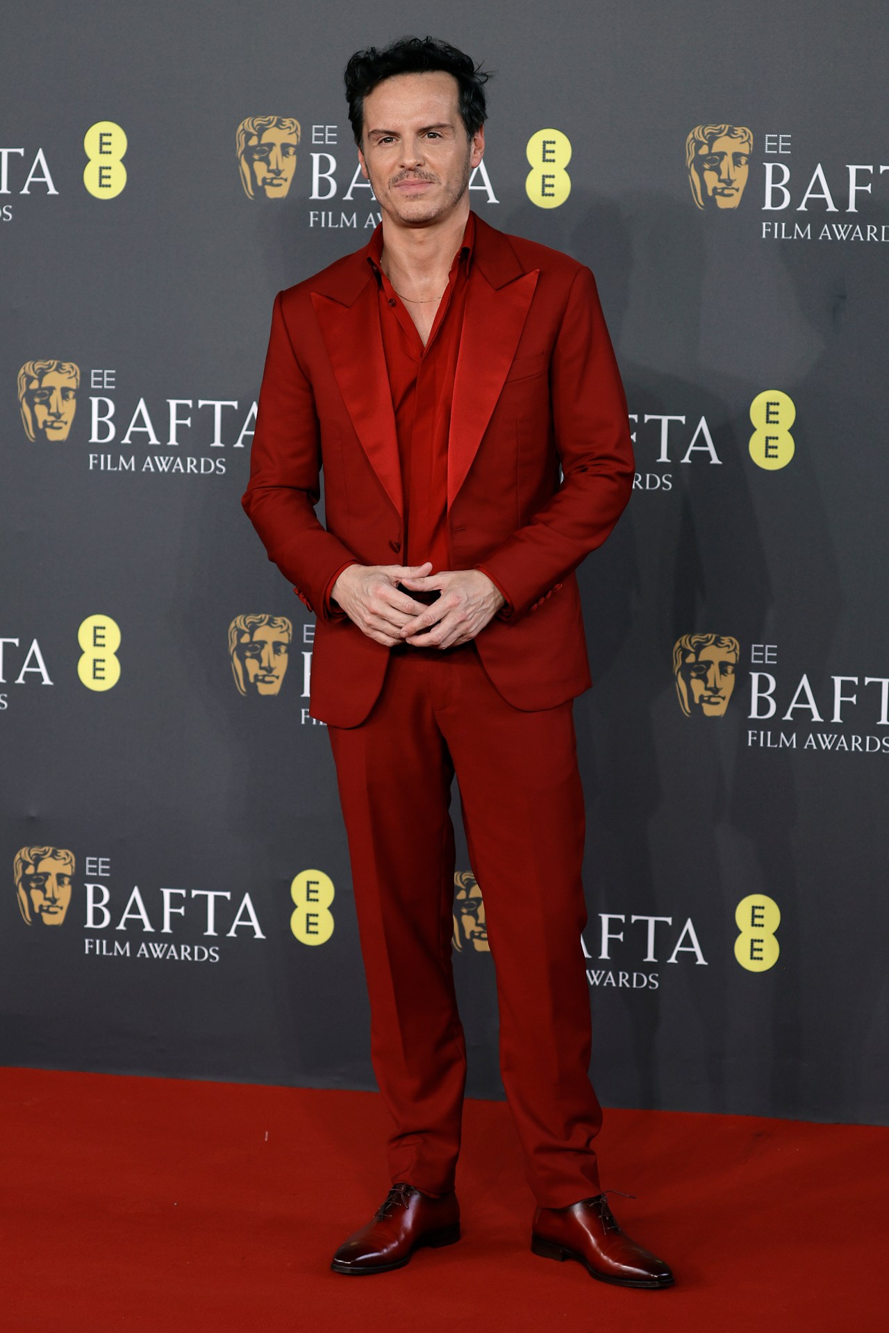 <h2><b>Andrew Scott in Berluti</b></h2><p>&ldquo;It&rsquo;s not the first time that Andrew Scott has embraced a scarlet tuxedo (he wore a crimson-red double-breasted suit from Berluti for the 2010 Critics Choice Awards), but his latest tomato hued two-piece stole the carpet (whilst simultaneously matching it) at the BAFTAs for me. Who needs to see another black suit in February in London?&rdquo; <i>&mdash;Katrina Israel, editor at large</i></p>