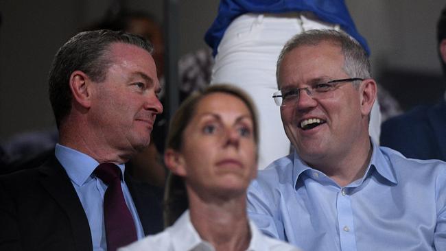 Australian Prime Minister Scott Morrison with Defence Minister Christopher Pyne (left) at the Invictus Games on Saturday. Picture: AAP