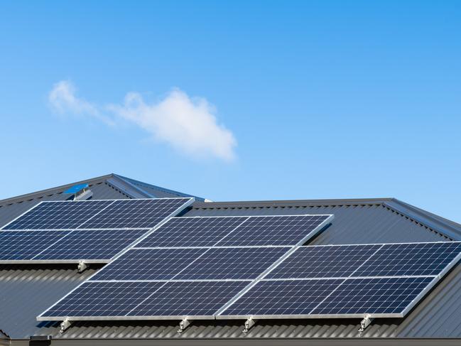 New solar panels installed on metal sheet roof of the house in South Australia