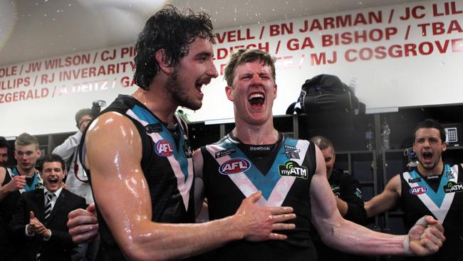 Port Adelaide’s John Butcher and Tom Jonas.