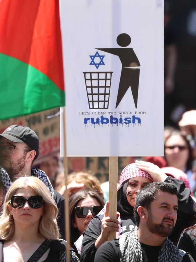 One of the anti-Semitic signs on display during the demonstration. Picture: NCA NewsWire / Brendan Beckett