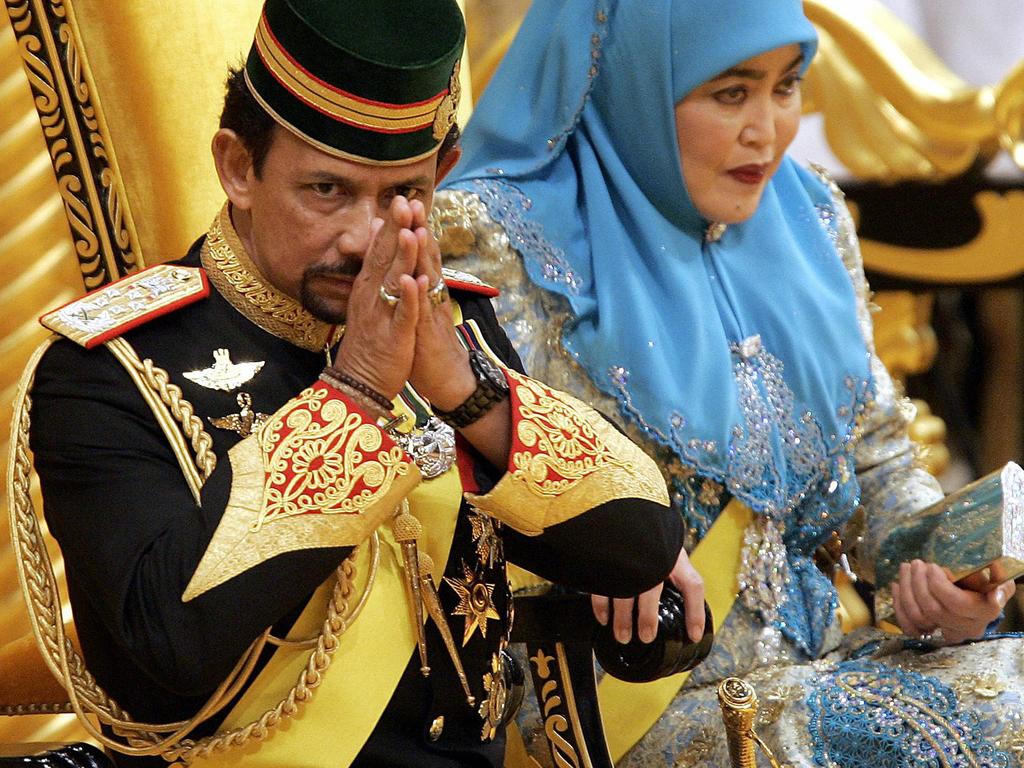 The sultan and his first wife Queen Saleha at his 59th birthday celebration ceremony in 2005.