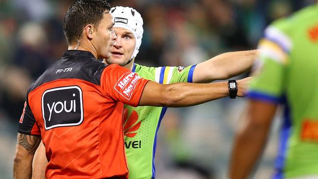 Raiders captain Jarrod Croker questions a decision with referee Henry Perenara. Picture: Getty Images