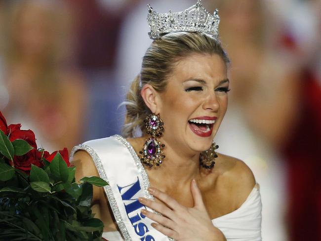 FILE - In this Jan. 12, 2013 file photo, Miss New York Mallory Hytes Hagan reacts as she is crowned Miss America 2013 in Las Vegas. Some former Miss Americas shamed in emails from the pageantâ€™s CEO are calling on him and other leaders of the Miss America Organization to resign. Haganâ€™s appearance and sexual habits were mocked in the emails.   (AP Photo/Isaac Brekken, File)