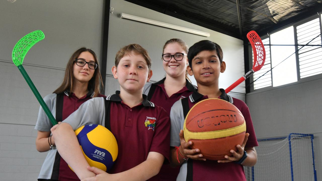 Poppy Longden, Ismari Van Der Westhuizen (front) Tanveer Salaria and Michael Steveno at Toolooa State High School's newest building.