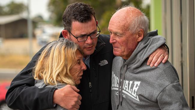 Premier Daniel Andrews speaks to Jilly Brown and husband Mel after they lost their 120-year-old Sarsfeild home and accommodation. Picture: Jason Edwards