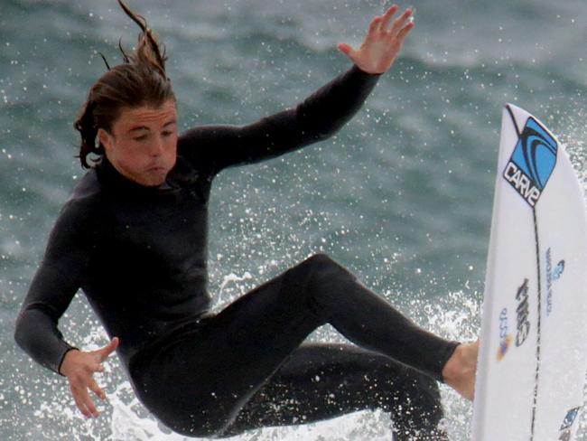 SOUTHERN COURIER/AAP. Tye Koolis poses for a photograph at Maroubra Beach, Sydney on Saturday 18 December, 2019. Maroubra surfer Tye Koolis will be competing in the upcoming Carve Pro at Maroubra.  Picture: Craig Wilson / AAP