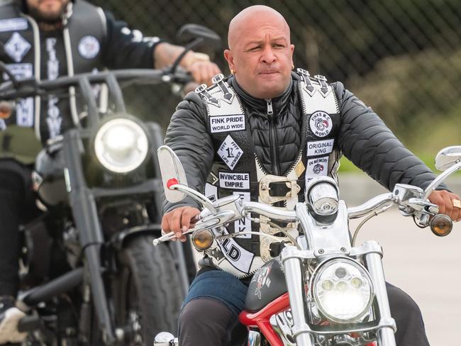 Finks outlaw motorcycle president Kosh Radford meeting up at a service station south of Wodonga with police also in force. Picture: Simon Dallinger.