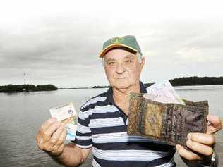 Bert Ranieri, of Alstonville, with the wallet and contents he fished out of the river in Ballina. . Picture: Doug Eaton