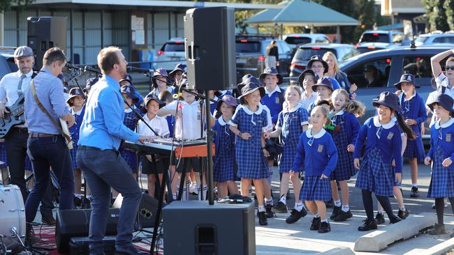 The Amazing Emmanuel College Teachers Band had the kids rocking their way to the first day back at the Carrara school. Picture Glenn Hampson