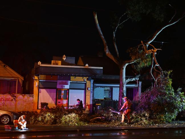 SES crews respond to fallen tree branches in Carlton North on Sunday. Picture: Josie Hayden