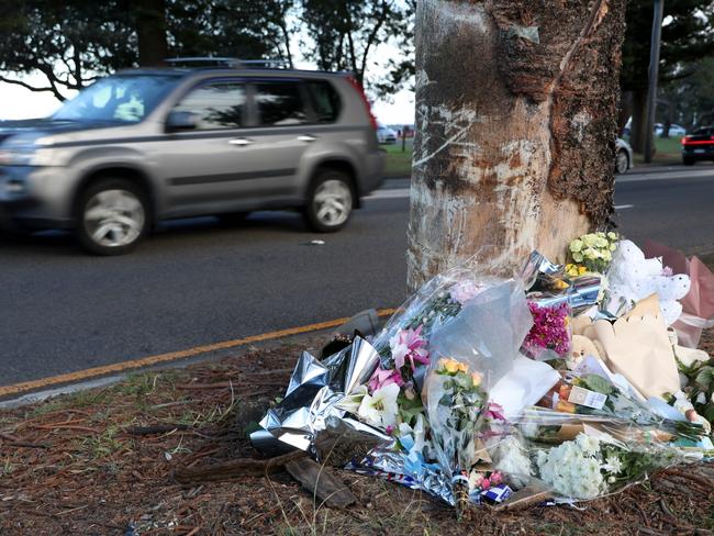 Floral tributes left at crash site on the Grand Pde at Monterey. Picture: Damian Shaw