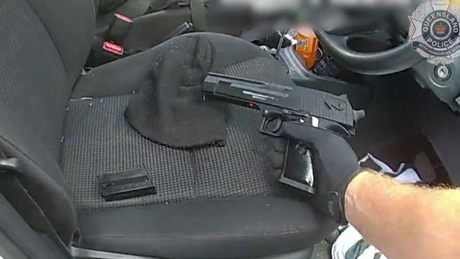 Police body worn camera footage showing a gel blaster which was found in a white Toyota Yaris being driven by a 47-year-old Masig Island man.