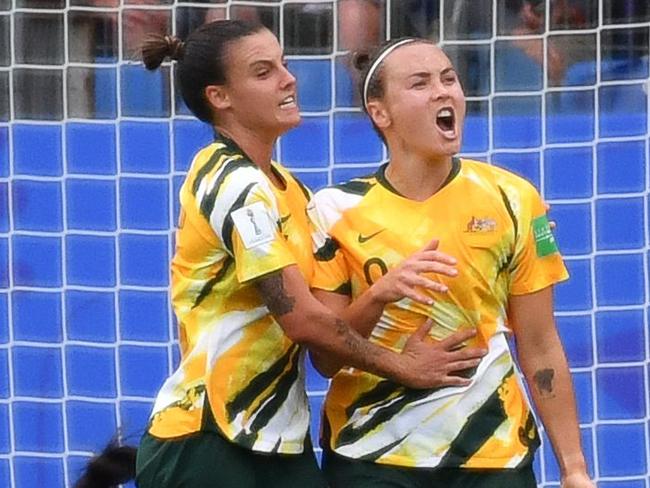 TOPSHOT - Australia's forward Caitlin Foord (C) celebrates after scoring a goal during the France 2019 Women's World Cup Group C football match between Australia and Brazil, on June 13, 2019, at the Mosson Stadium in Montpellier, southern France. (Photo by Pascal GUYOT / AFP)