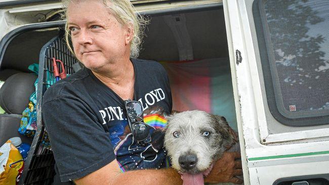 Scott Collins was reuinted with pet dog Percy, 6 after evacuating their home in Deepwater National Park last Sunday. A week on, they've been told they've lost everything.