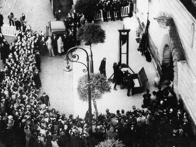 The scene of Eugene Weidmann’s execution by guillotine in Paris on June 17, 1939.domain