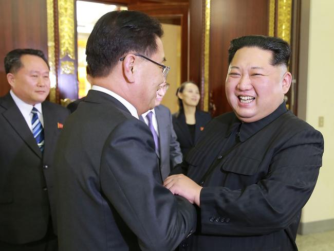 TOPSHOT - This picture taken on March 5, 2018 and released from North Korea's official Korean Central News Agency (KCNA) on March 6, 2018 shows North Korean leader Kim Jong-Un (R) shaking hands with South Korean chief delegator Chung Eui-yong (C), who travelled as envoys of the South's President Moon Jae-in, during their meeting in Pyongyang.   North Korean leader Kim Jong Un discussed ways to ease tensions on the peninsula with visiting South Korean envoys, the state KCNA news agency reported on March 6. / AFP PHOTO / KCNA VIA KNS / STR / / AFP PHOTO / KCNA VIA KNS / STR / SOUTH KOREA OUT / REPUBLIC OF KOREA OUT   ---EDITORS NOTE--- RESTRICTED TO EDITORIAL USE - MANDATORY CREDIT 