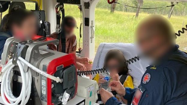 The father and his primary school aged daughter survived deadly floodwaters by clinging to a tree for two days until they could get help. Photo: RACQ LifeFlight