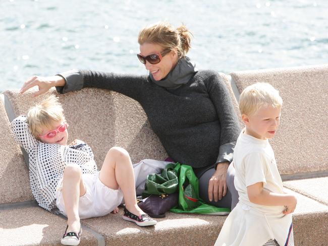 The actress relaxes with her children Adelaide and Banjo in Sydney in 2009.