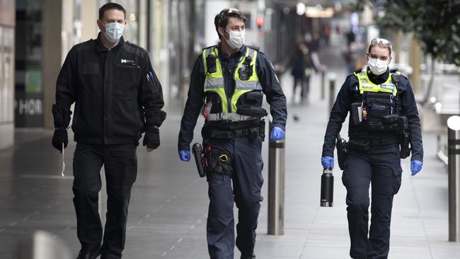 Police officers patrolling the CBD during Stage 3 coronavirus restrictions. Picture: David Geraghty