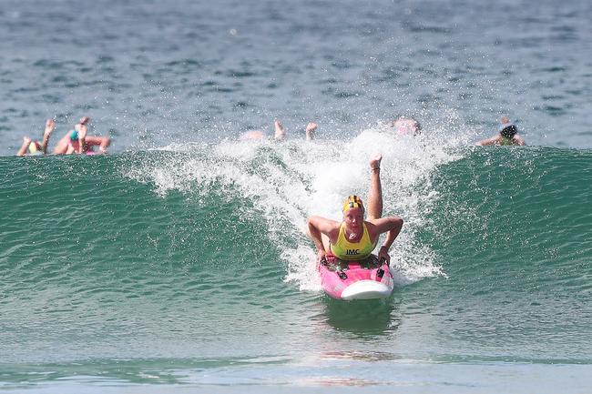 Phoebe Woodhouse, 15, from the Burnie Surf Life Saving Club, competing in the Tasmanian Surf League Carnival at Clifton Beach. Picture: NIKKI DAVIS-JONES