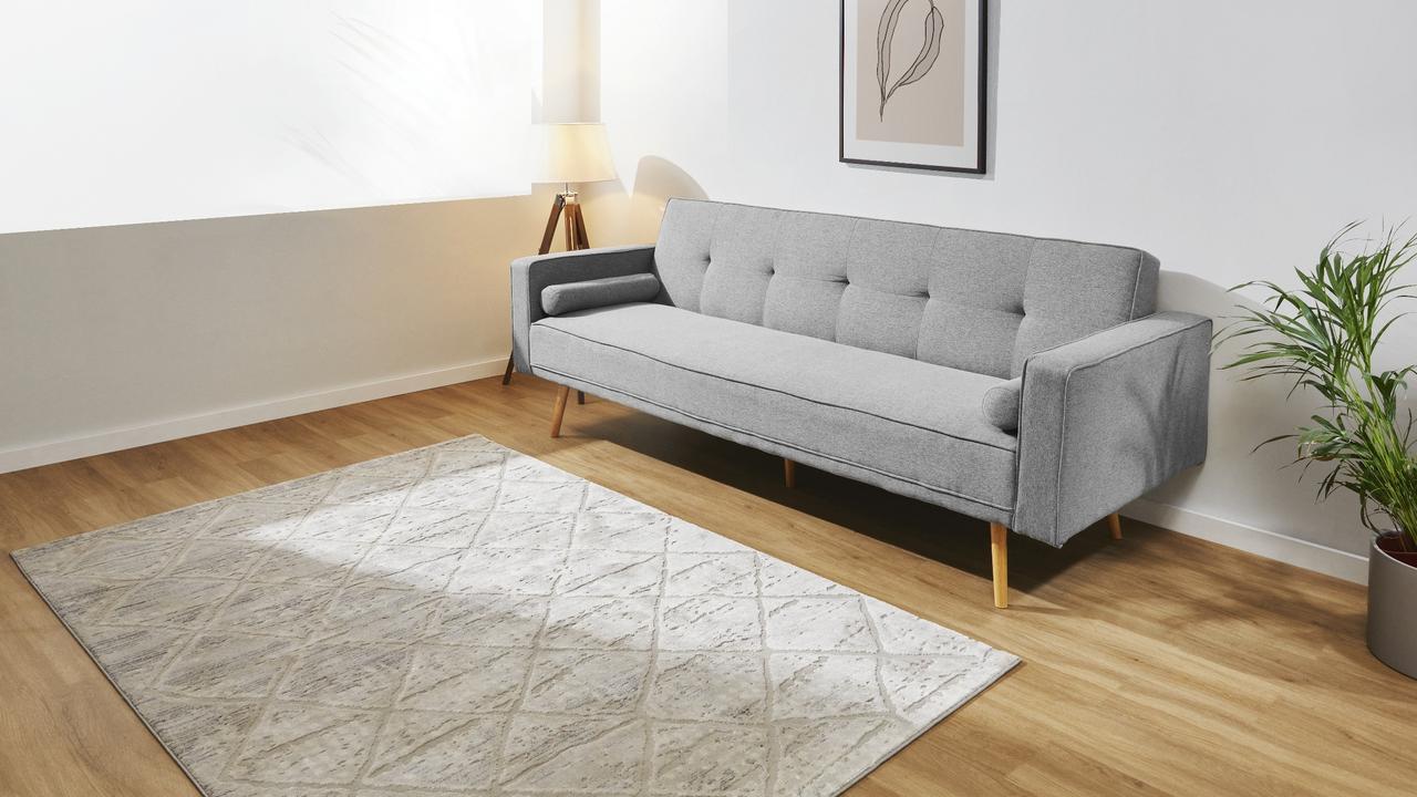 Shoppers can also nab this stylish grey sofa bed for $299.