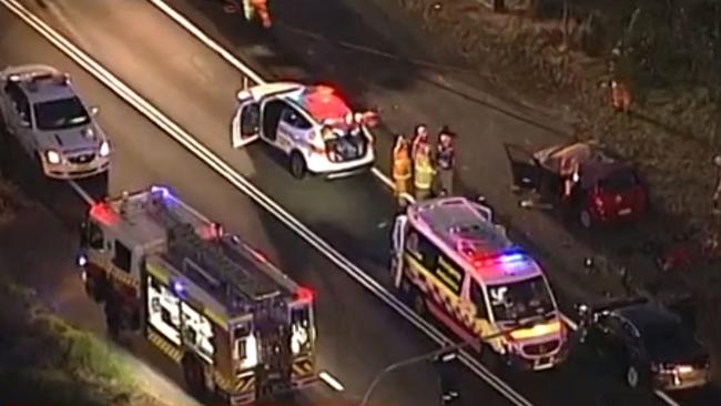 Emergency services attend the crash scene. The accident happened just before 5pm on Friday.