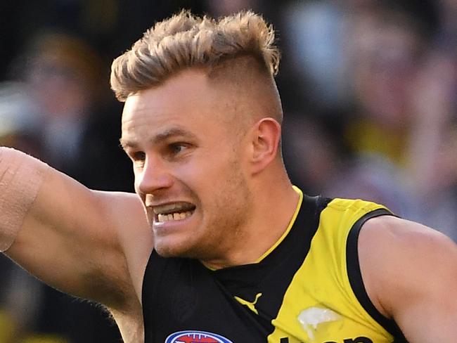 Brandon Ellis of the Tigers reacts after kicking a goal during the Round 18 AFL match between the Richmond Tigers and the Port Adelaide Power at the MCG in Melbourne, Saturday, July 20, 2019. (AAP Image/Julian Smith) NO ARCHIVING, EDITORIAL USE ONLY