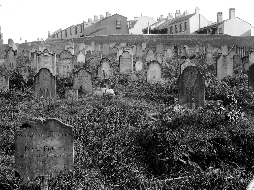 The undulating land became surrounded by houses.