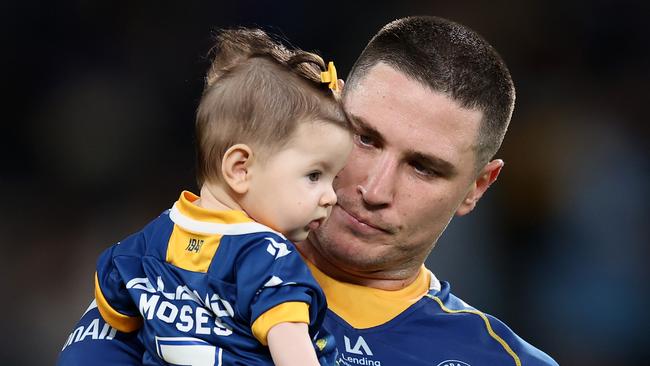 Moses with his daughter Aspyn. Photo by Mark Kolbe/Getty Images