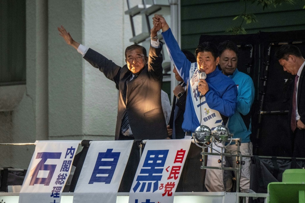 Japan ruling coalition projected to lose majority in election