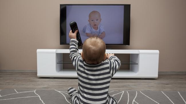 Generic photo of a baby watching TV kids / television