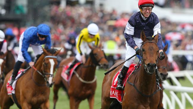 Kerrin McEvoy takes it all in after riding Almandin to victory in the Melbourne Cup.