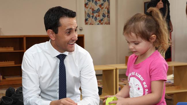 Opposition Leader David Crisafulli and Astrid, 4, at a Townsville daycare centre on Monday. Picture: Liam Kidston