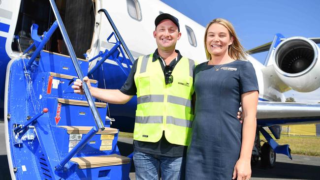 Machjet International managing director Simon McDermott with wife Abbie McDermott outside a Machjet International plane currently with no hangar at the Sunshine Coast Airport. Picture: Patrick Woods.