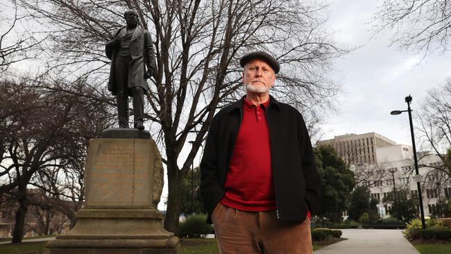 Professor Greg Lehman of UTAS at the William Crowther statue in Franklin Square Hobart. He believes the statue should be moved to the Tasmanian Museum and Art Gallery. Picture: Nikki Davis-Jones