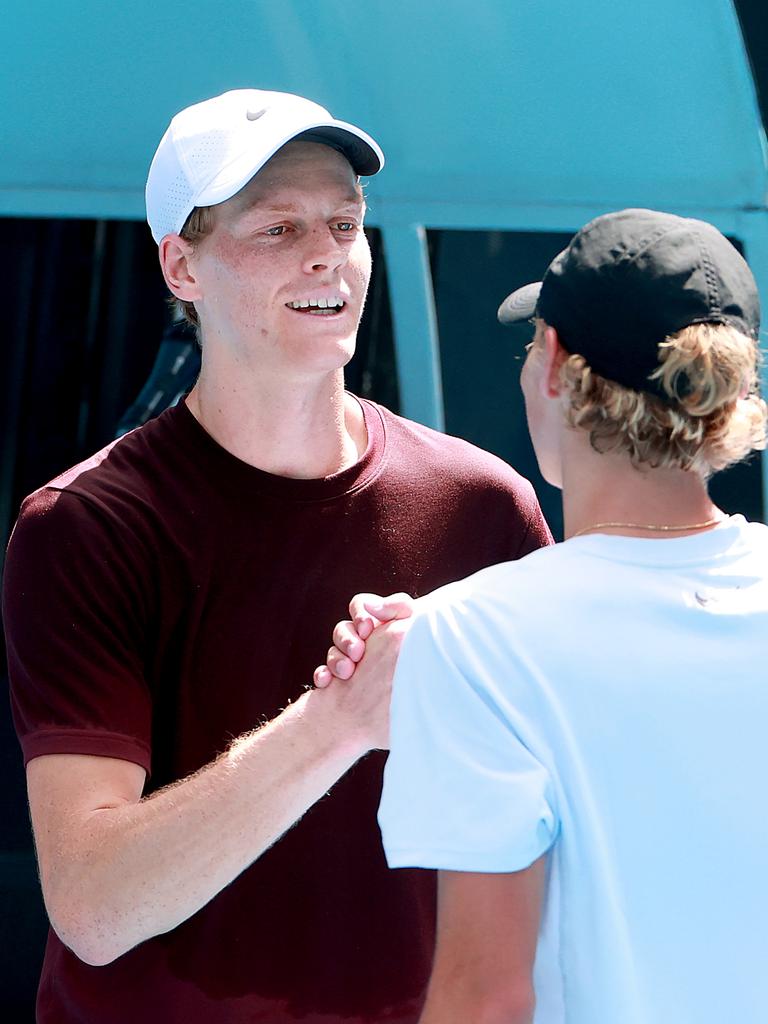 Jannik Sinner with Cruz Hewitt. (Photo by Kelly Defina/Getty Images)