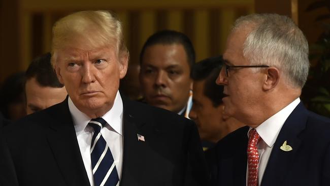 US President Donald Trump has agreed to honour a migrant deal with Prime Minister Malcolm Turnbull.