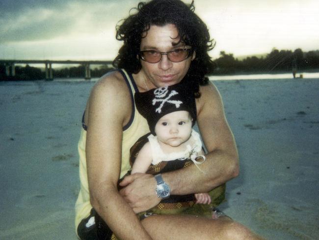 Michael Hutchence pictured with his only child Heavenly Hirani Tiger Lily.