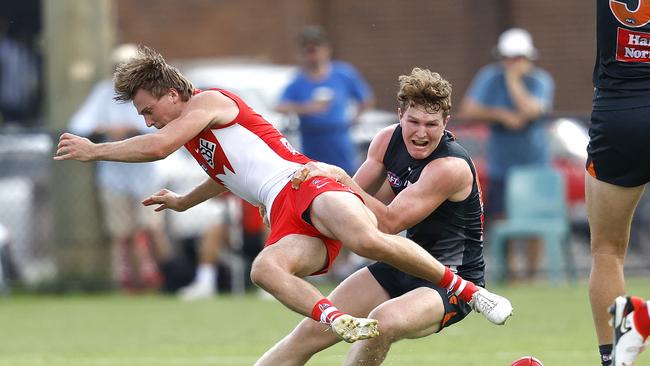 Giants Tom Green ragdolls Sydney's James Jordon during Thursday’s practice match. Picture: Phil Hillyard