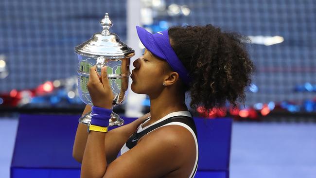 Naomi Osaka of Japan kisses the trophy in celebration after winning her Women's Singles final match against Victoria Azarenka of Belarus on Day Thirteen of the 2020 US Open. Picture: Getty