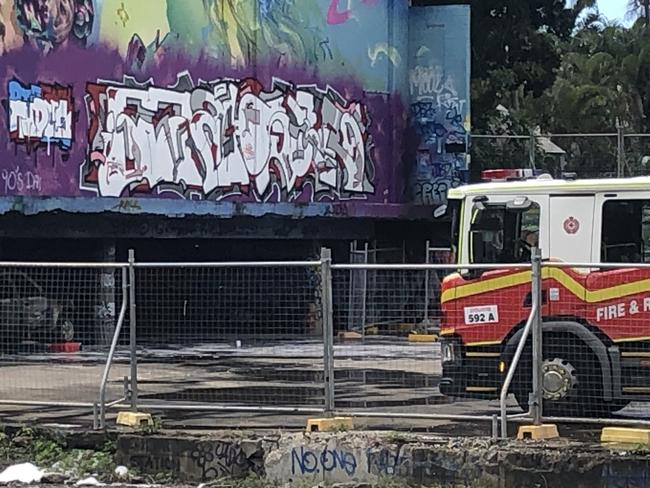 Fire crews in attendance at a suspicious fire under a building on Hockings St, South Brisbane. Picture: Shaye Windsor